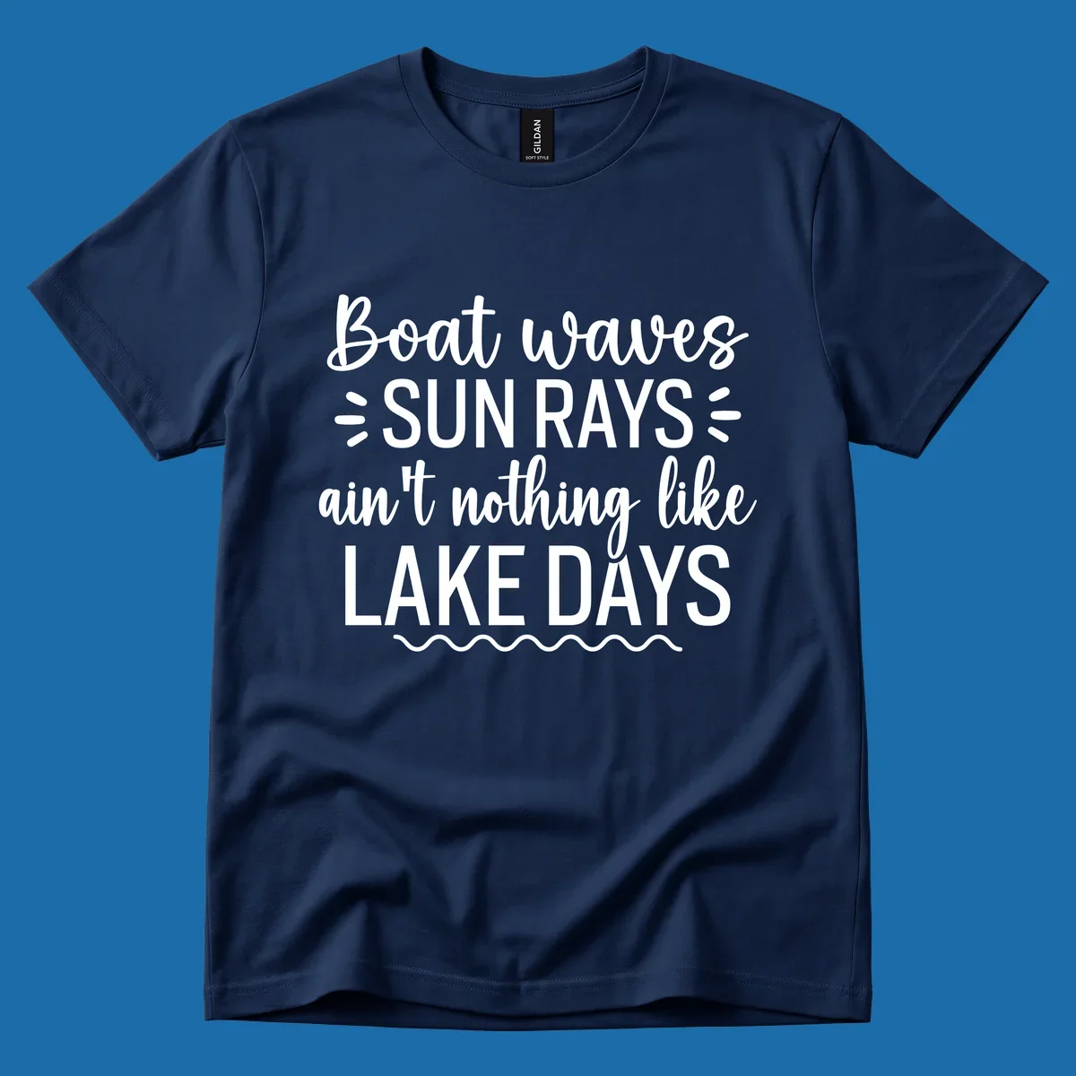 White text design for lake days, featuring boat waves, sun rays, and wavy line accents.