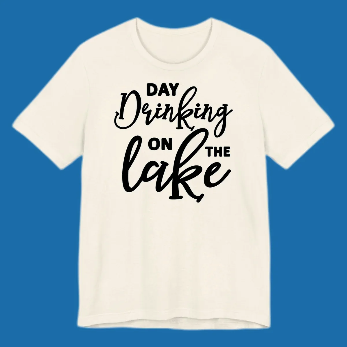 Typography design reading 'Day Drinking On The Lake' for lake day apparel.
