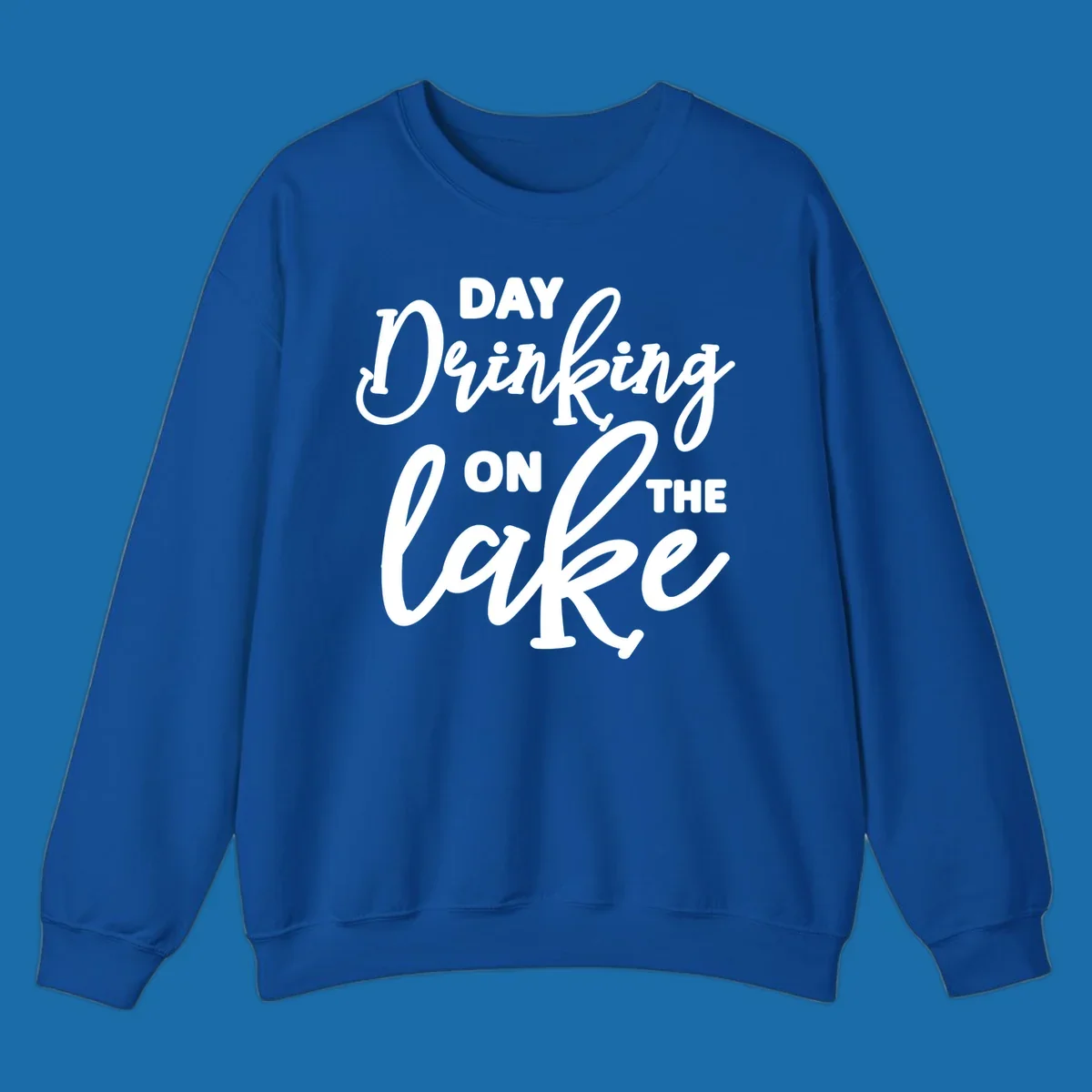 Typography design reading 'Day Drinking On The Lake' for lake day apparel.