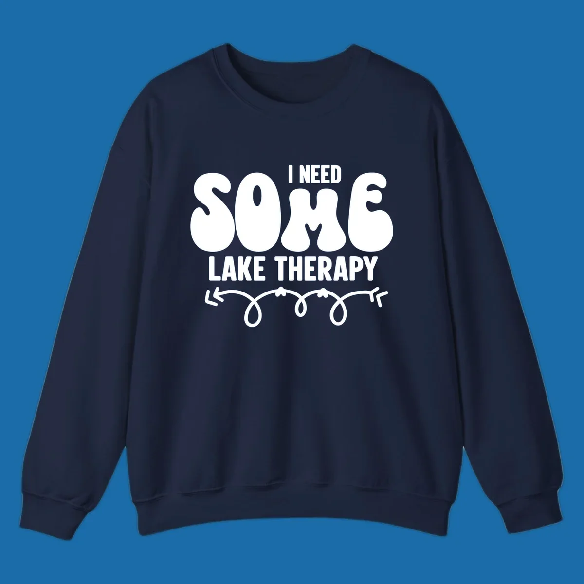 White "I Need Some Lake Therapy" text design with decorative wavy arrow line.
