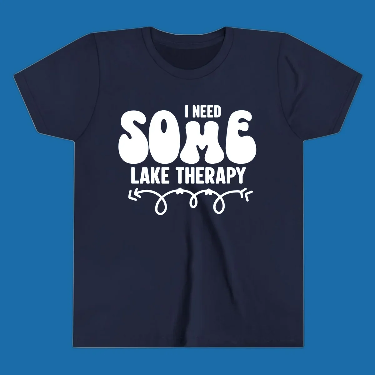 White "I Need Some Lake Therapy" text design with decorative wavy arrow line.
