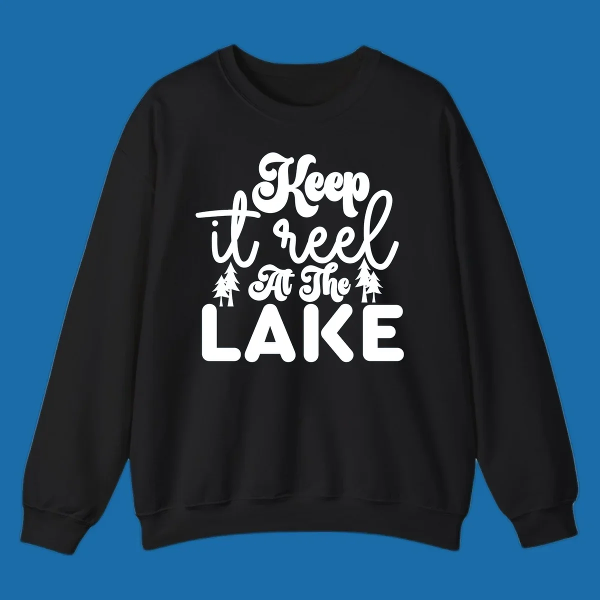 Keep it reel at the lake typography design with pine trees.