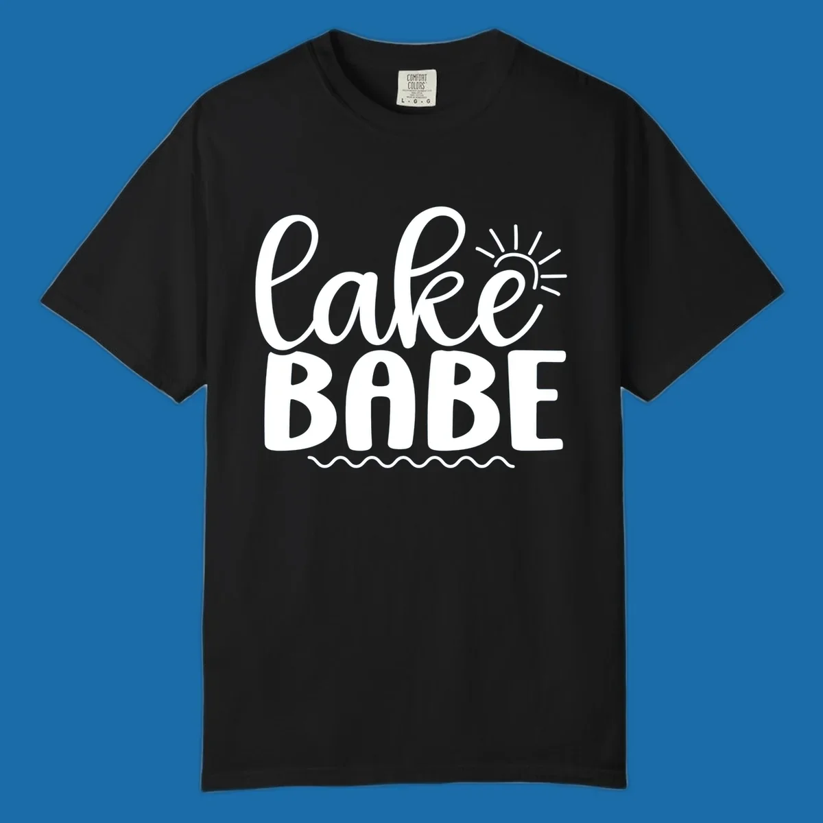 Lake Babe text design with sun rays and wavy lines.