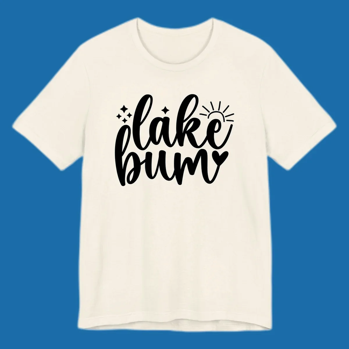 Lake bum text design with sun, sparkles, and heart graphic.