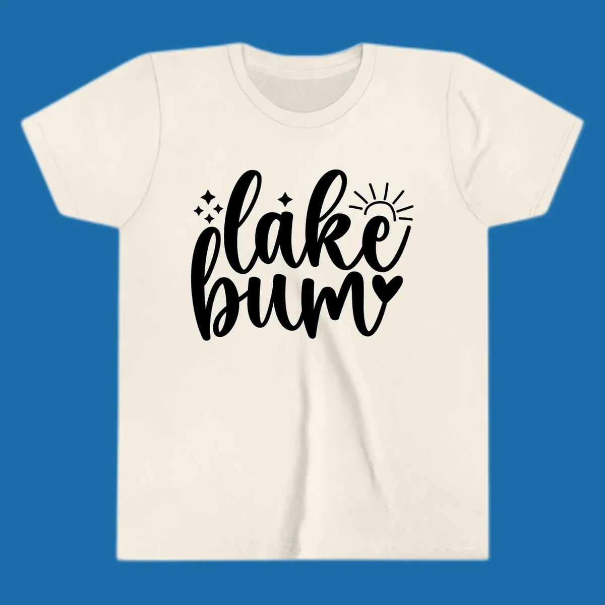 Lake bum text design with sun, sparkles, and heart graphic.