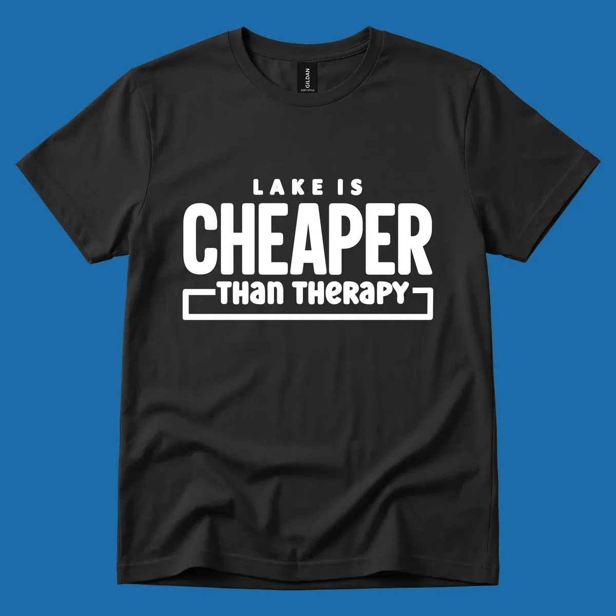 White text reads "LAKE IS CHEAPER THAN THERAPY", a humorous phrase about lake life.