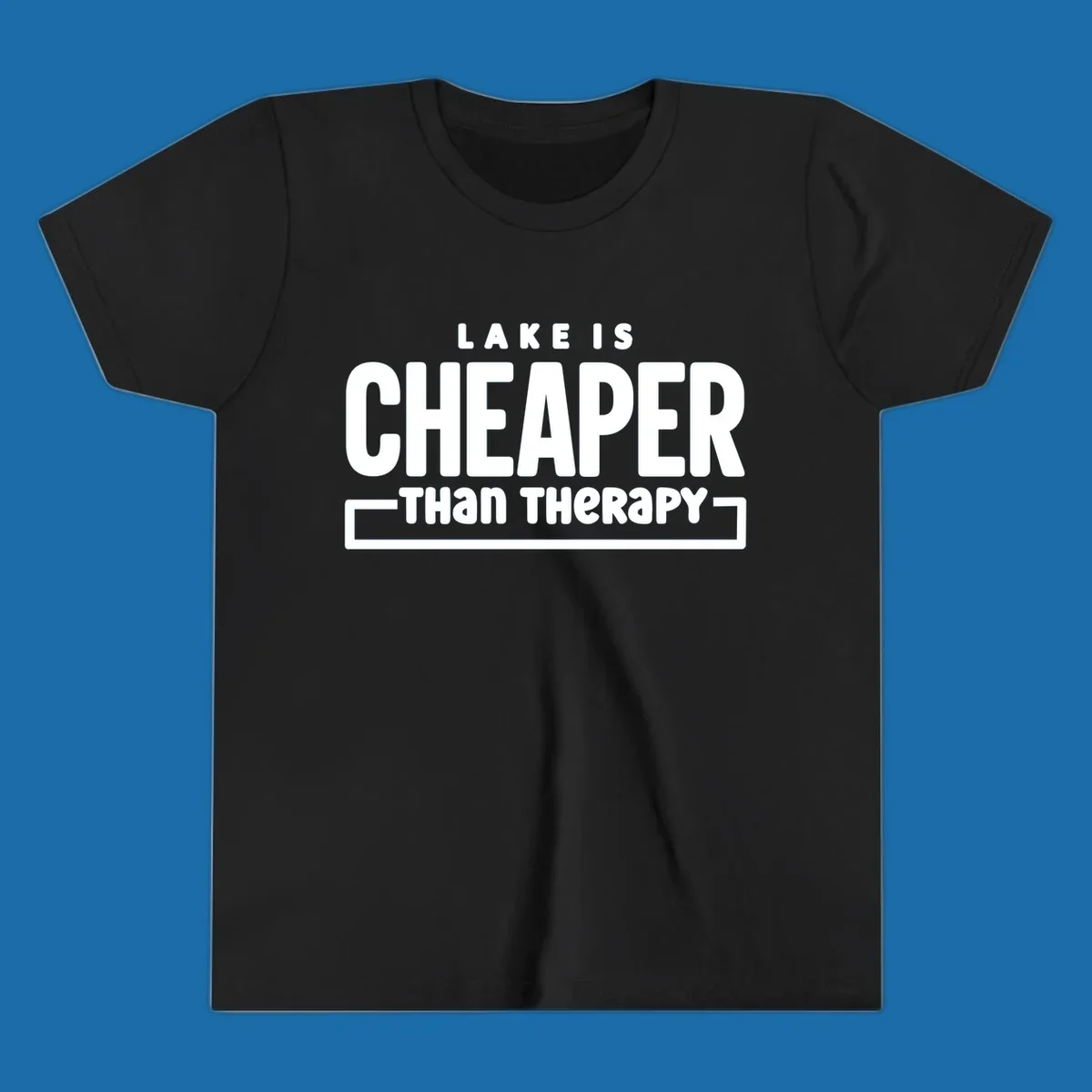 White text reads "LAKE IS CHEAPER THAN THERAPY", a humorous phrase about lake life.