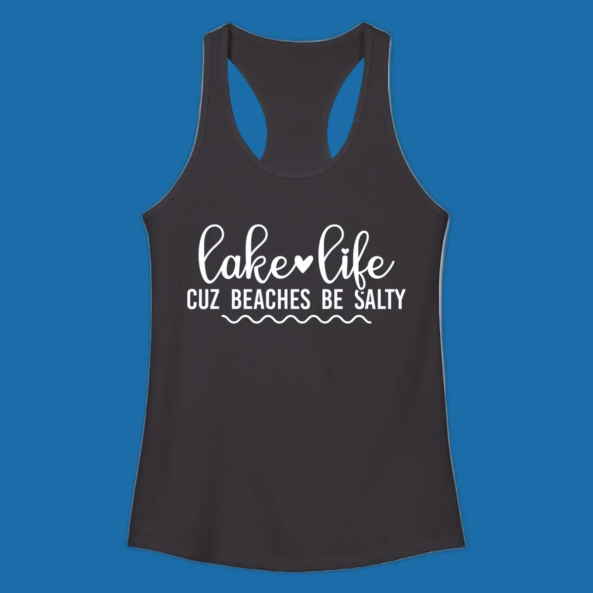 Lake life cuz beaches be salty text design with heart and wavy lines.