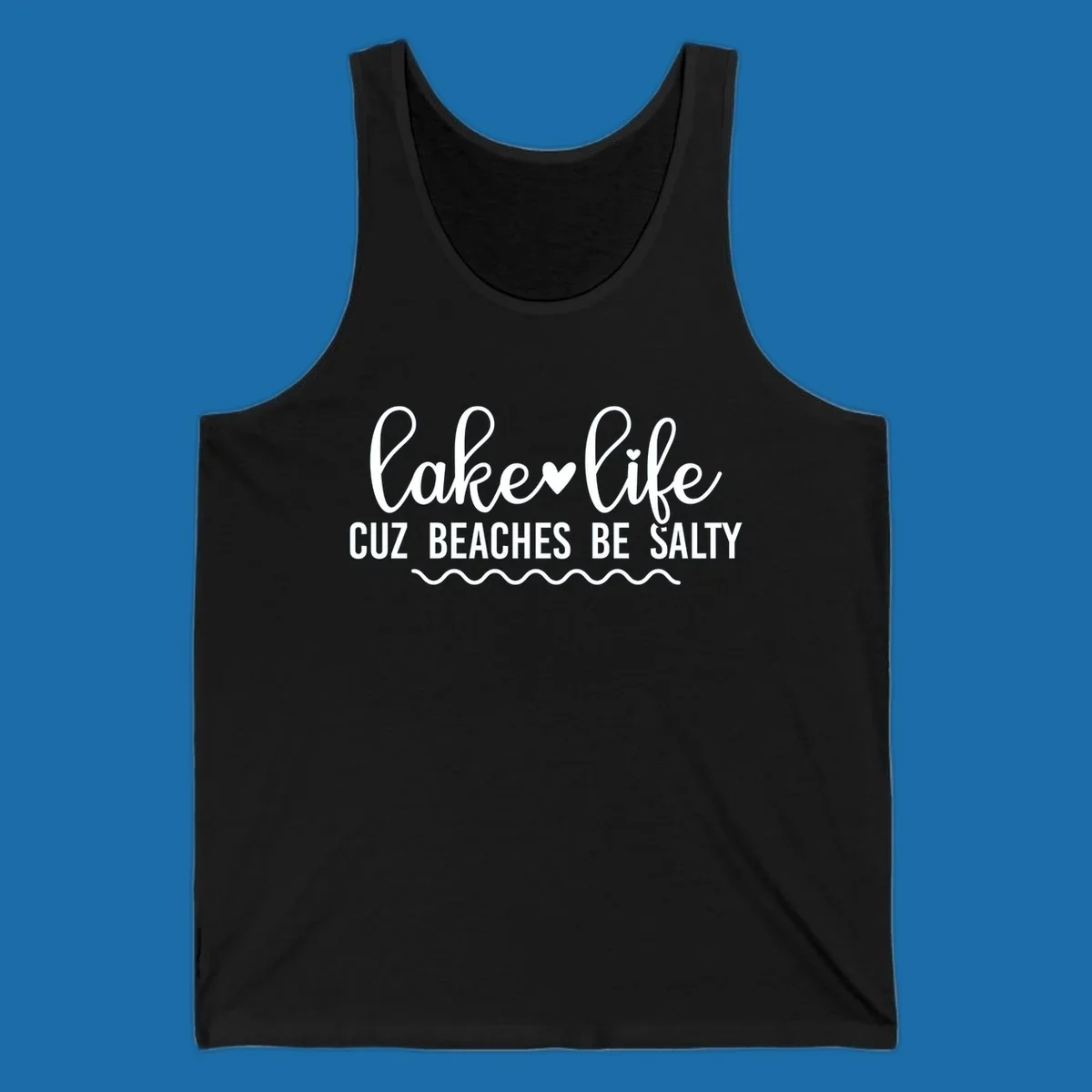 Lake life cuz beaches be salty text design with heart and wavy lines.