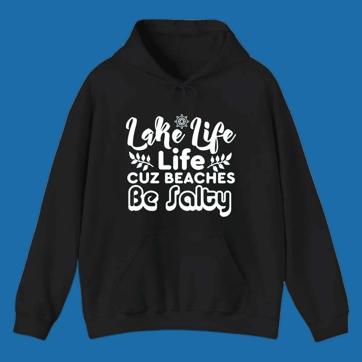 Lake Life Cuz Beaches Be Salty typography design with ship wheel and leaf accents.