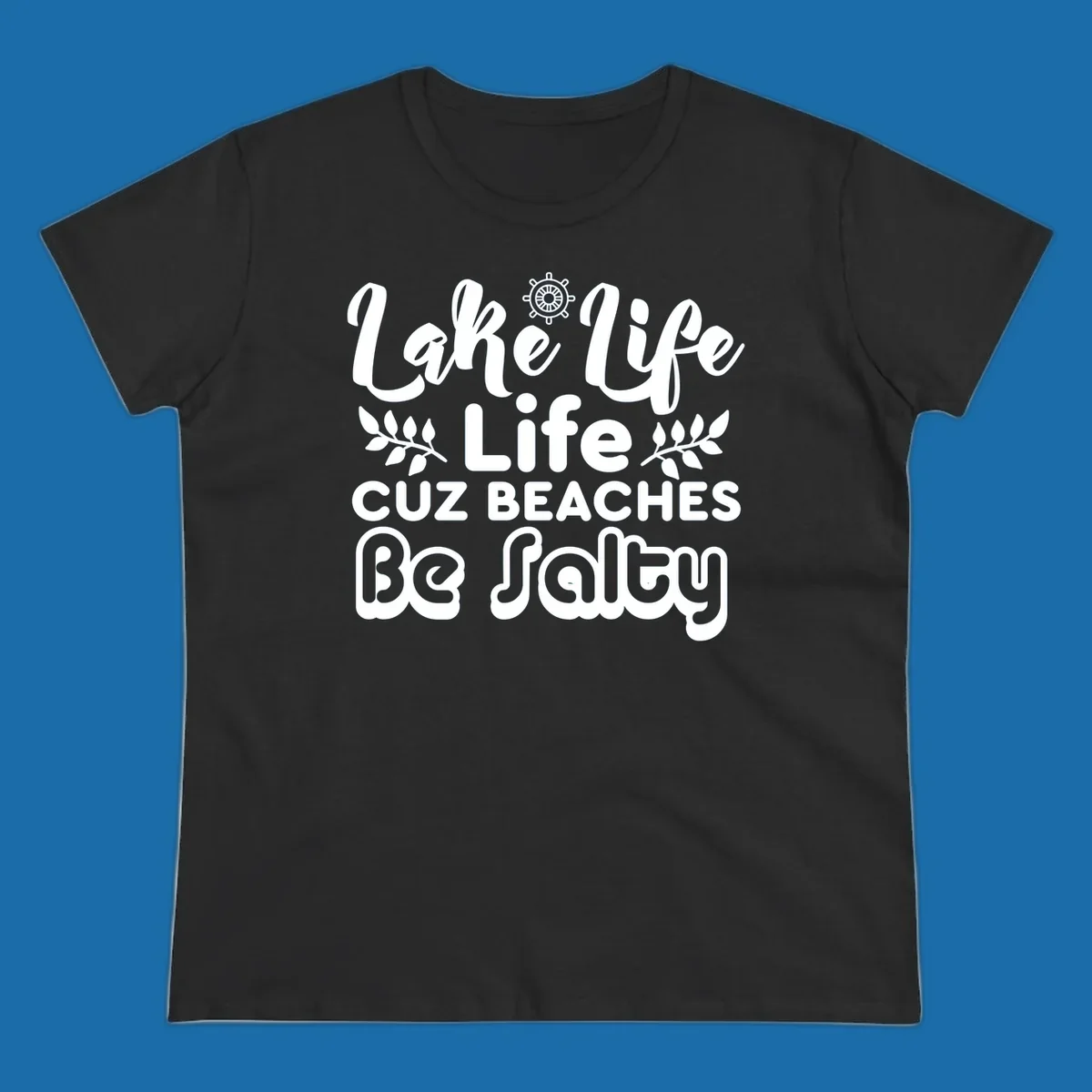 Lake Life Cuz Beaches Be Salty typography design with ship wheel and leaf accents.