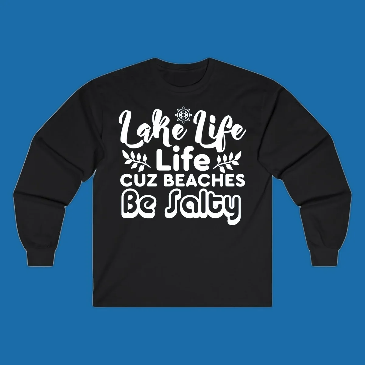Lake Life Cuz Beaches Be Salty typography design with ship wheel and leaf accents.