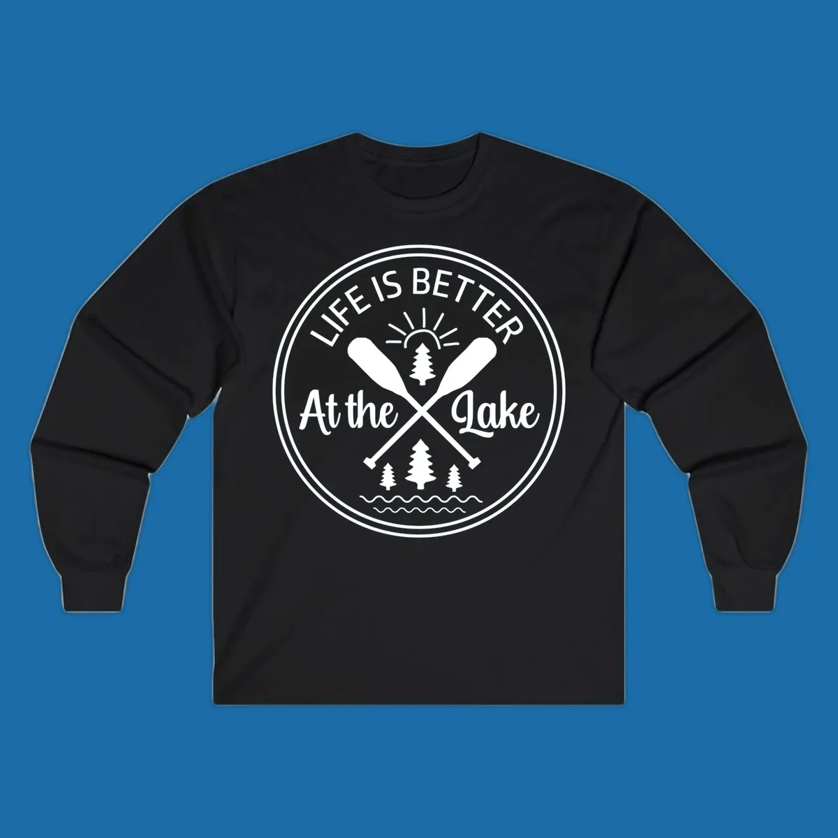 Life is better at the lake circular badge with oars, trees, sun, and waves.