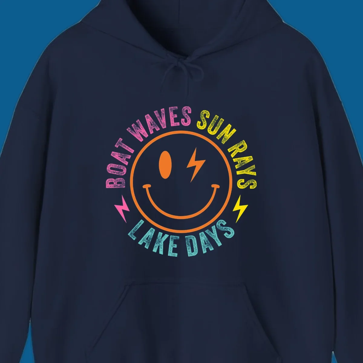 Smiley face with lightning bolt and text 'BOAT WAVES SUN RAYS LAKE DAYS' in a circle. Lake-life smiley.