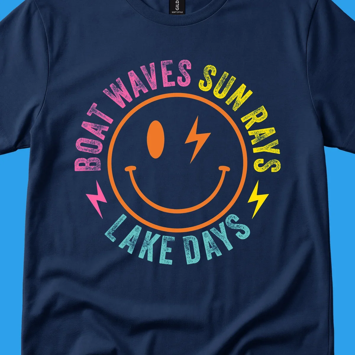 Smiley face with lightning bolt and text 'BOAT WAVES SUN RAYS LAKE DAYS' in a circle. Lake-life smiley.