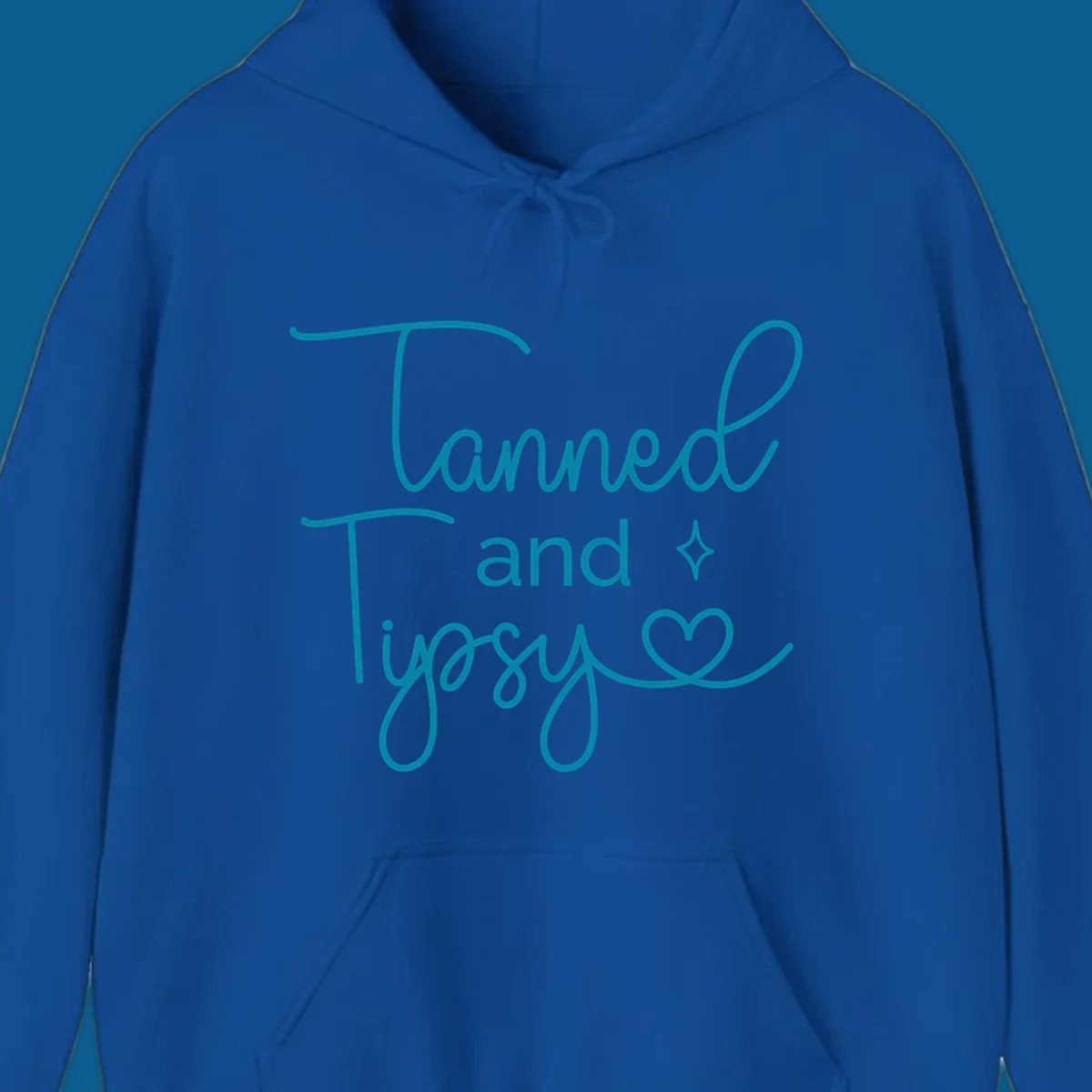 Tanned and Tipsy text with star and heart graphic