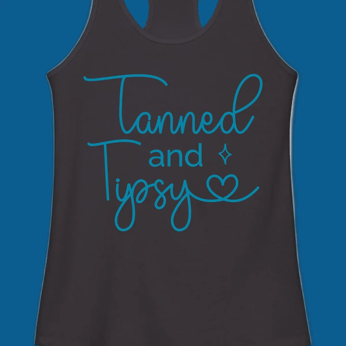 Tanned and Tipsy text with star and heart graphic