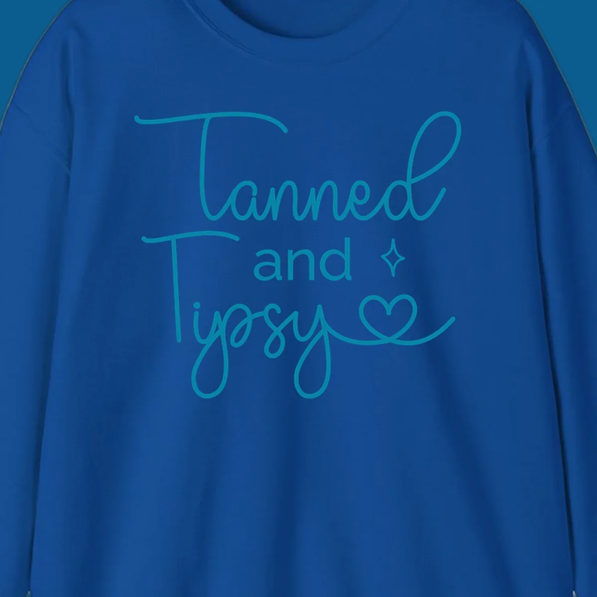 Tanned and Tipsy text with star and heart graphic