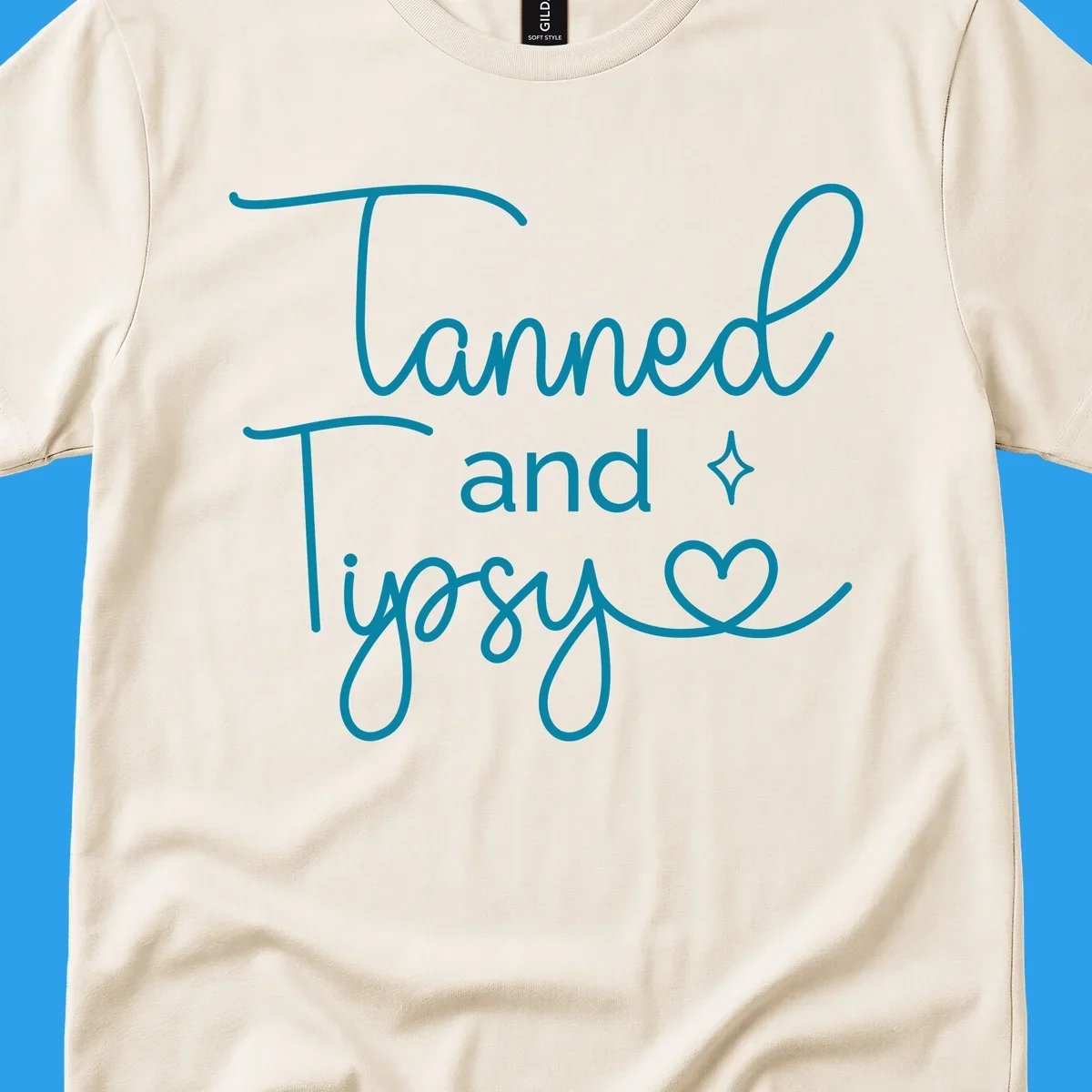 Tanned and Tipsy text with star and heart graphic