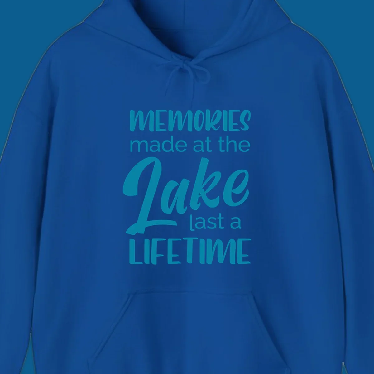 Typography design with the phrase "Memories made at the Lake last a Lifetime" in teal.