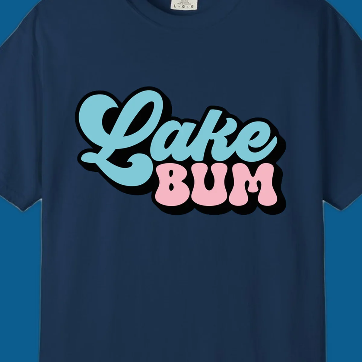 Retro script text design with 'Lake' in light blue and 'BUM' in pink, on a black background. Lake bum style.