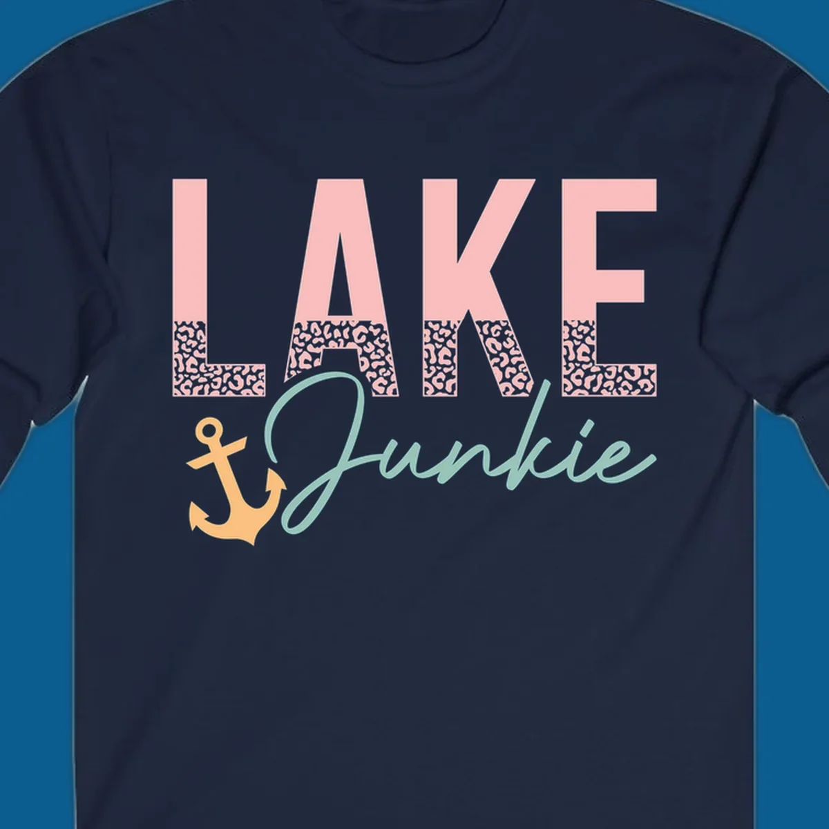 Lake Junkie text with anchor and leopard print, lake-life apparel graphic.