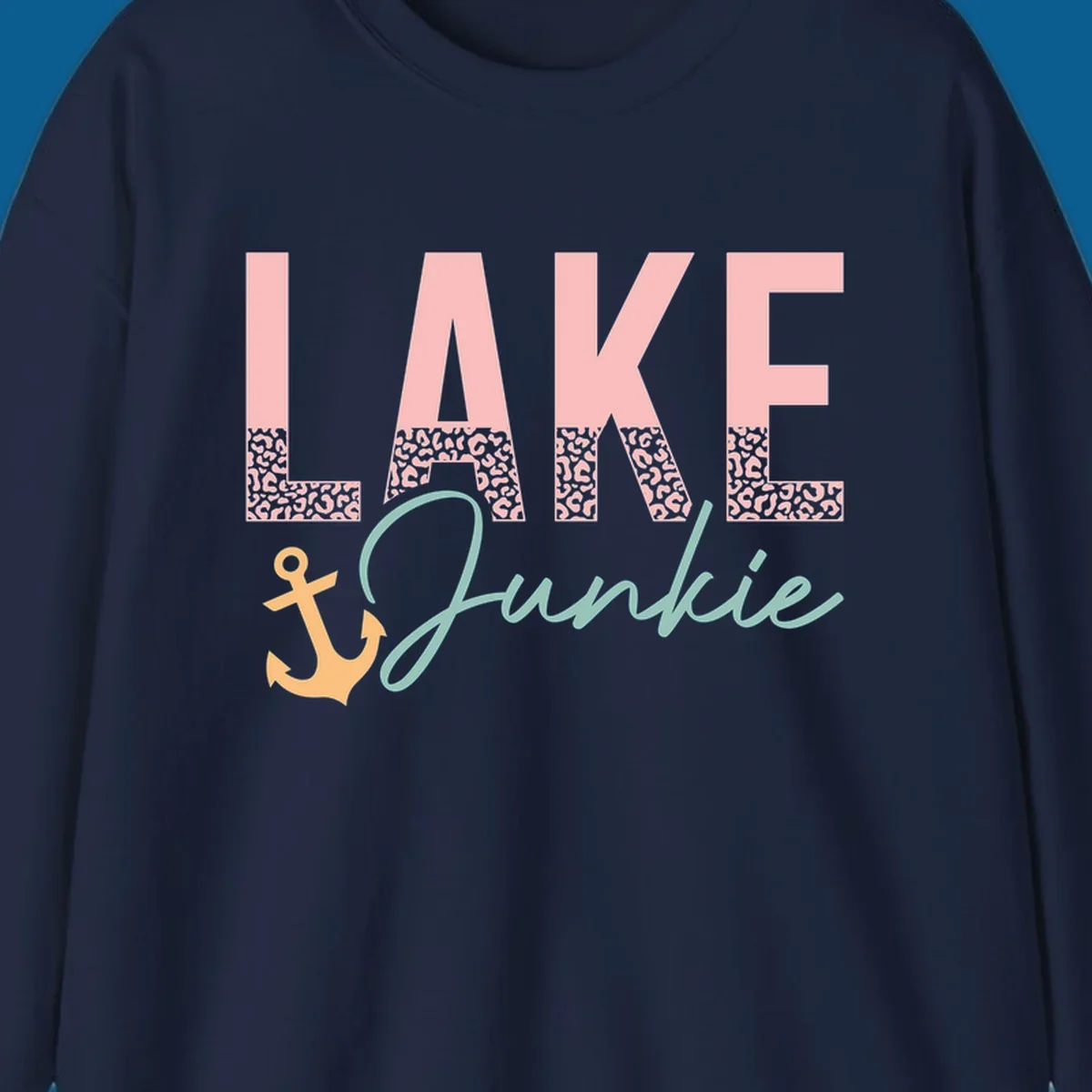 Lake Junkie text with anchor and leopard print, lake-life apparel graphic.