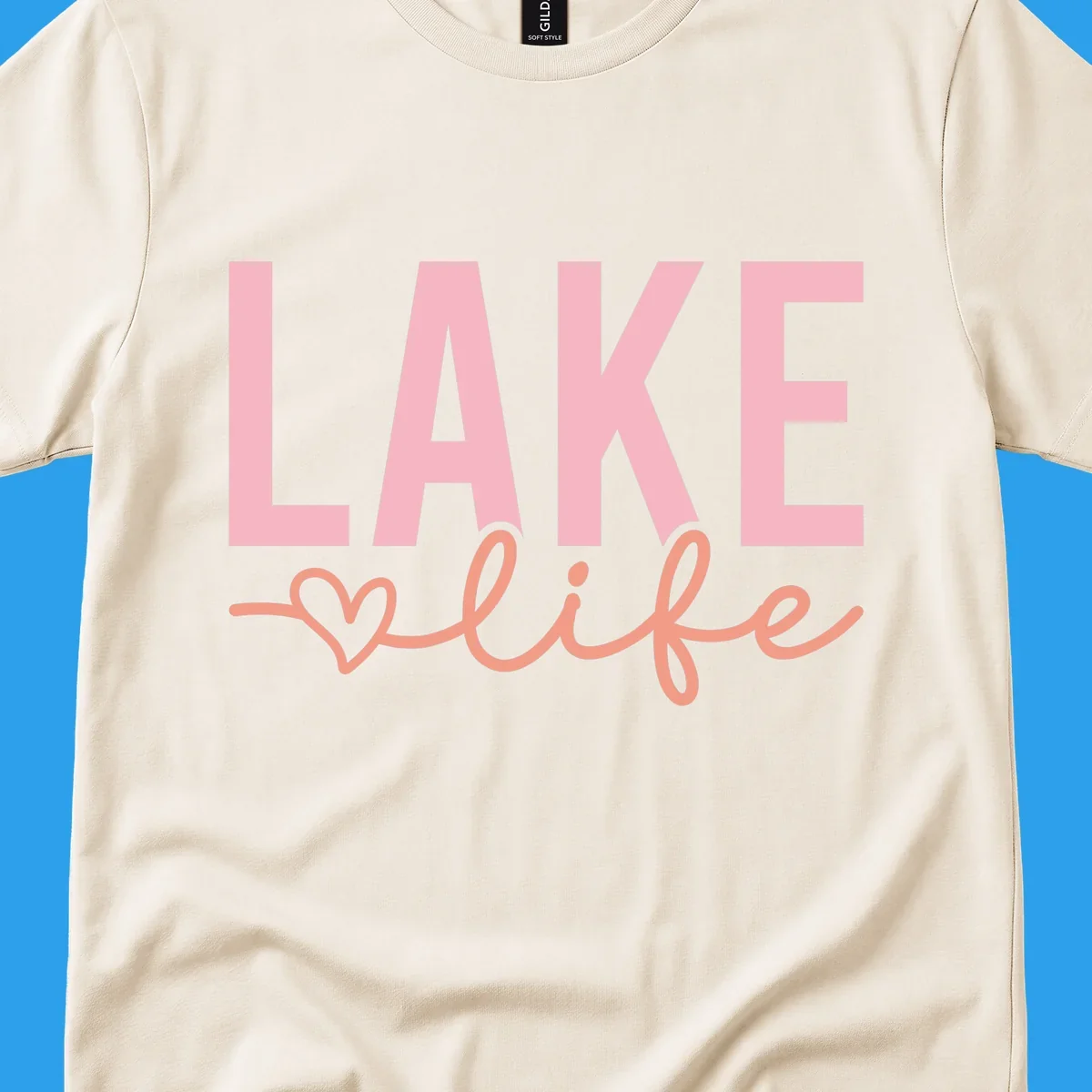 Lake life script design with pink letters and peach cursive text with a heart. lake-life-script