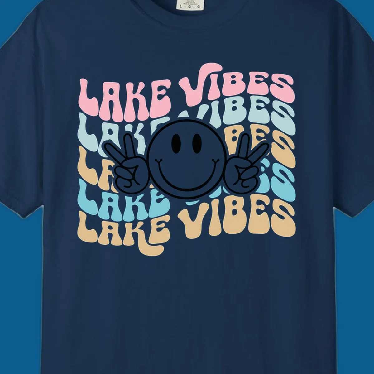 Retro lake vibes text with a black smiley face and peace signs.