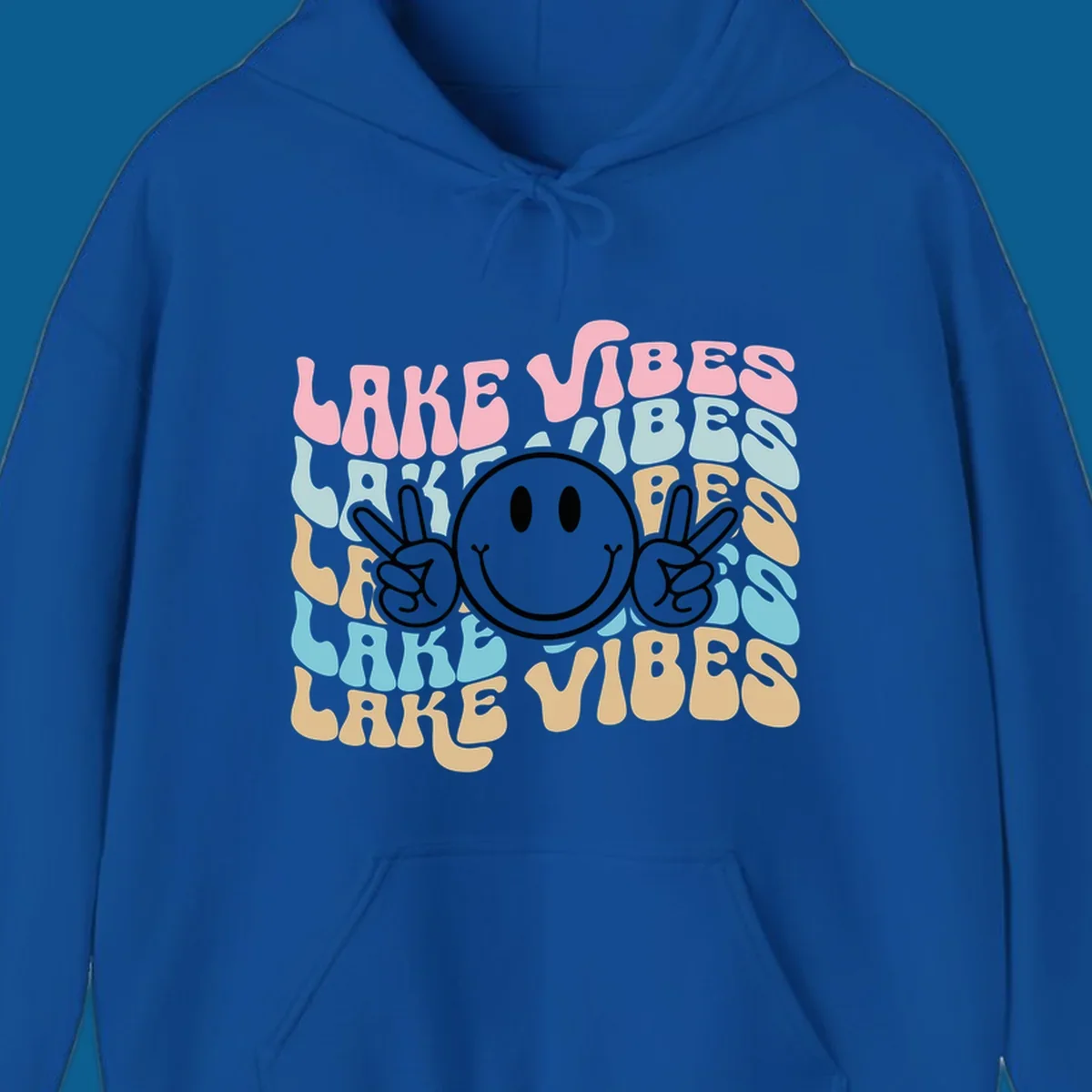 Retro lake vibes text with a black smiley face and peace signs.