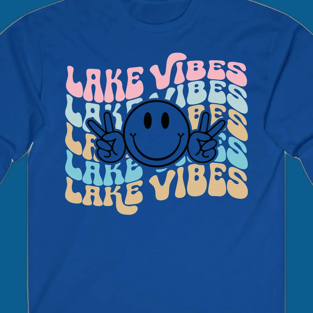 Retro lake vibes text with a black smiley face and peace signs.