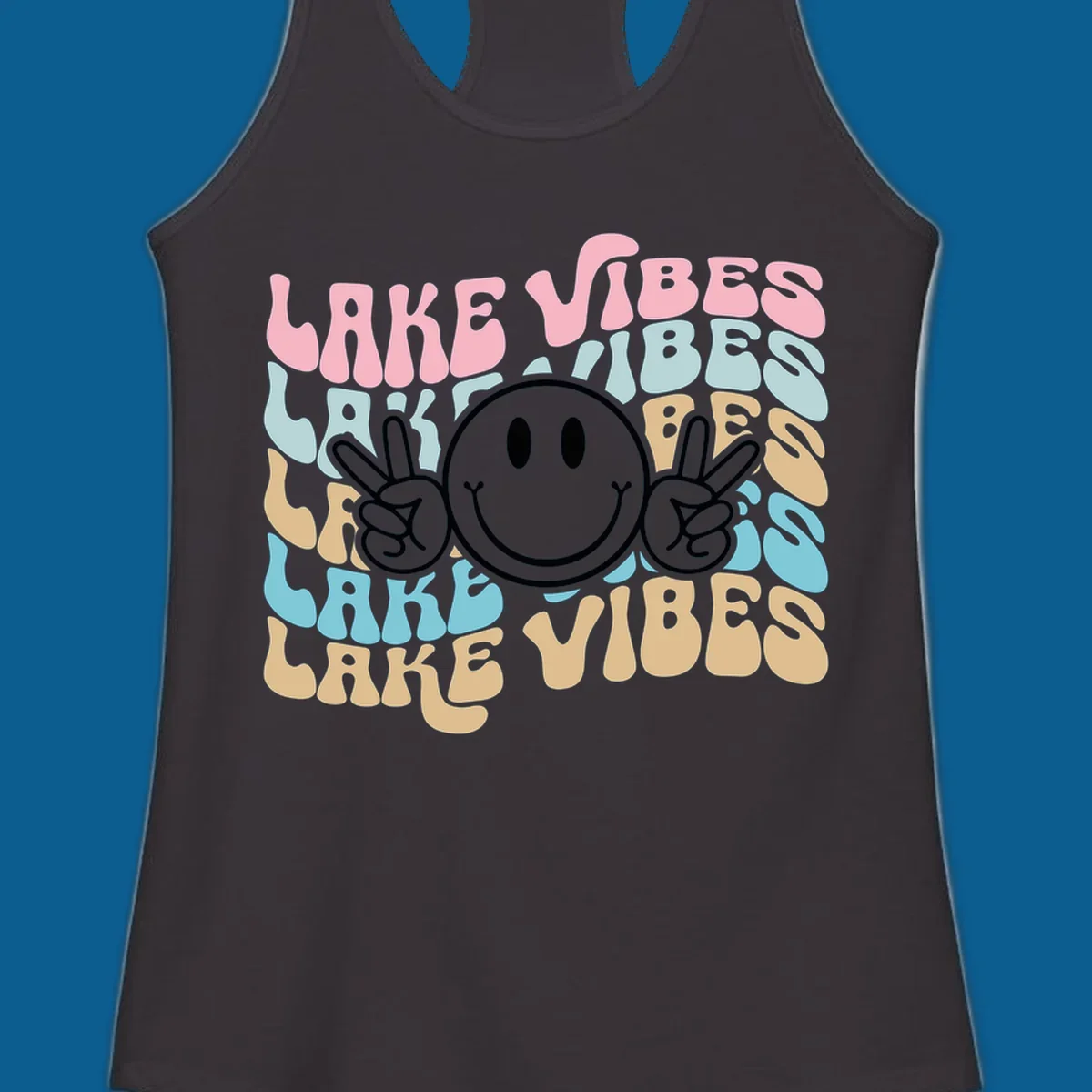 Retro lake vibes text with a black smiley face and peace signs.
