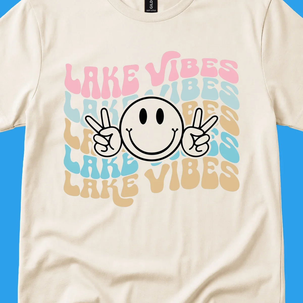 Retro lake vibes text with a black smiley face and peace signs.