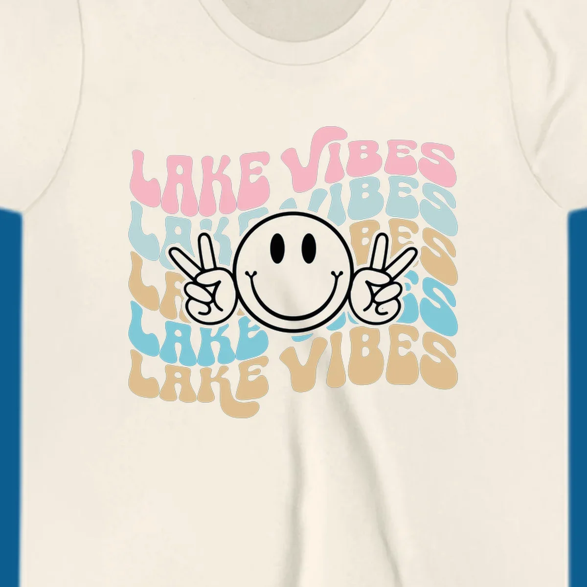 Retro lake vibes text with a black smiley face and peace signs.