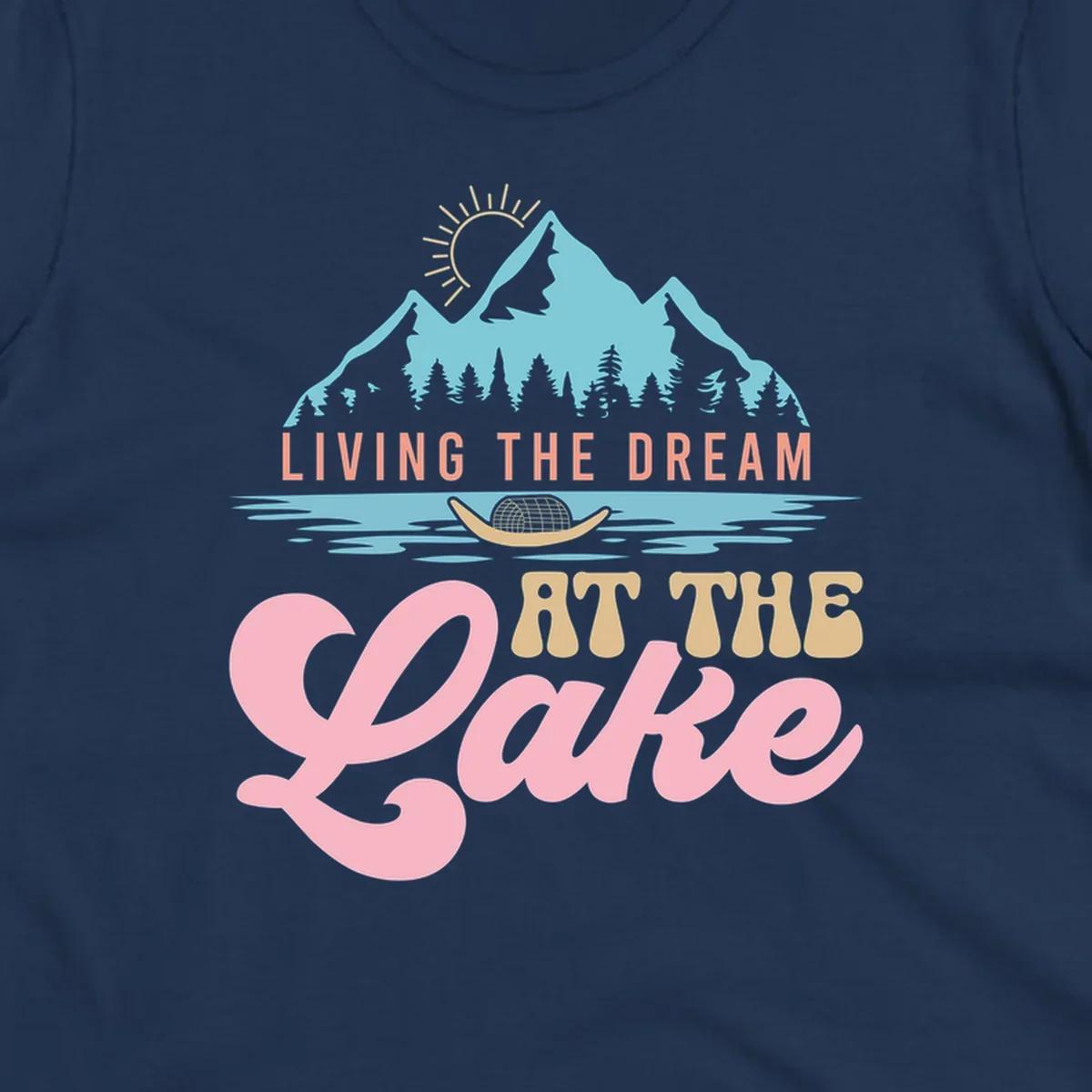 Illustration of mountains and lake with text 'Living The Dream At The Lake', representing the lake-life-dream concept.