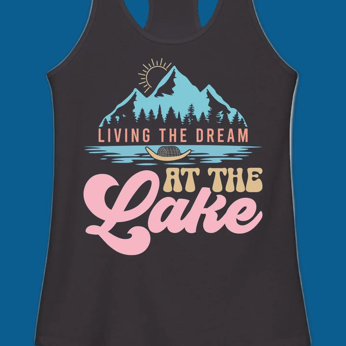 Illustration of mountains and lake with text 'Living The Dream At The Lake', representing the lake-life-dream concept.