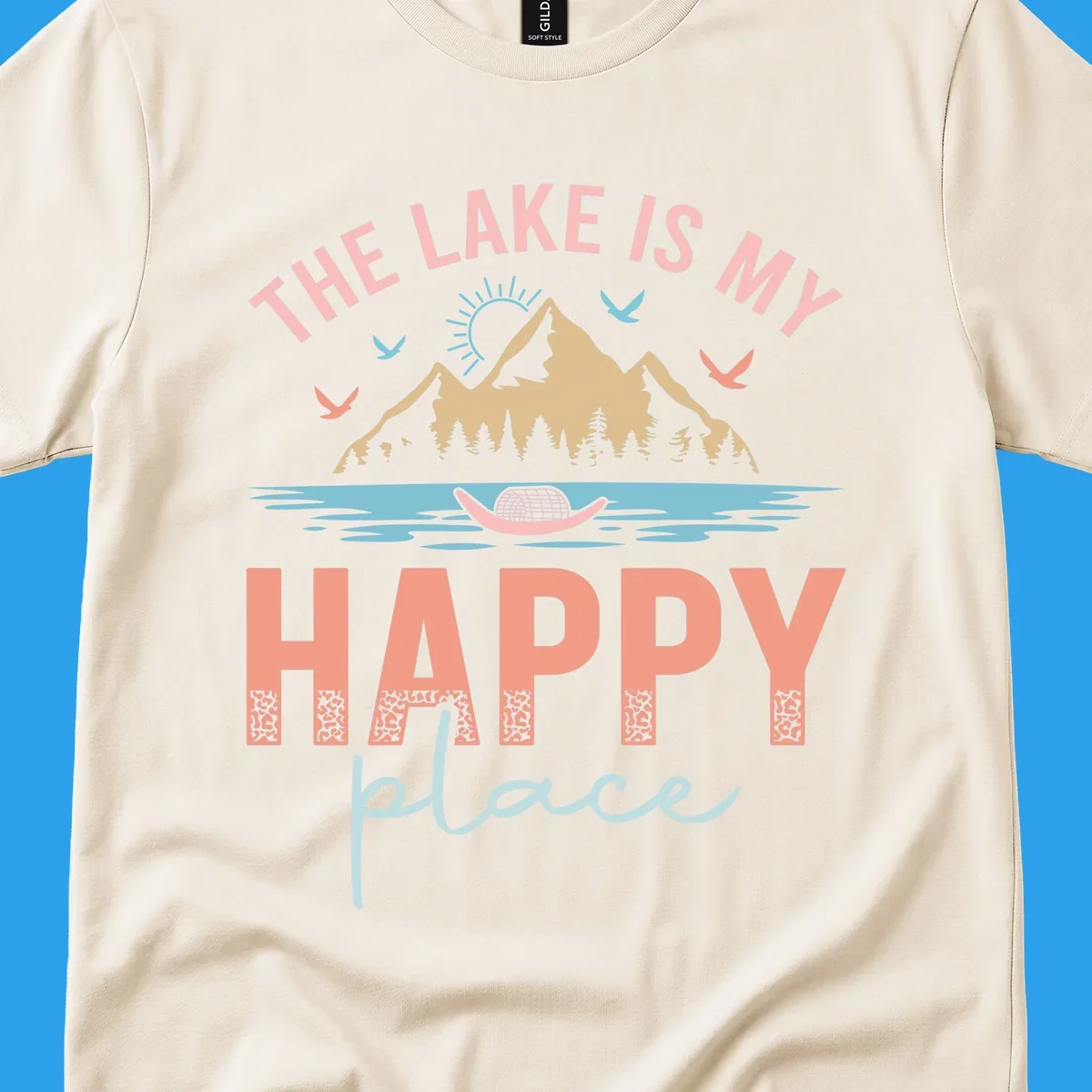 The Lake Is My Happy Place design with mountains, sun, birds, lake, and text.