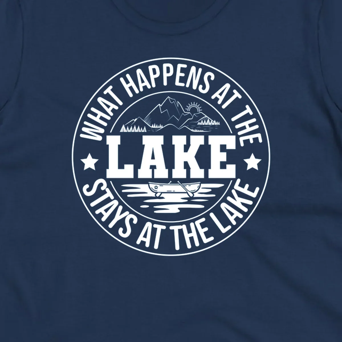 Circular badge with text 'What Happens At The Lake Stays At The Lake' and lake scene graphic.