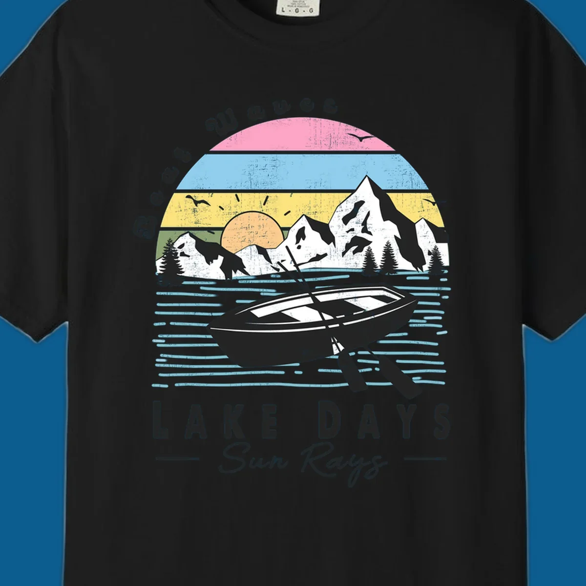 Vintage lake boat scenic design with mountains and sun, text reads Boat Waves, LAKE DAYS Sun Rays.