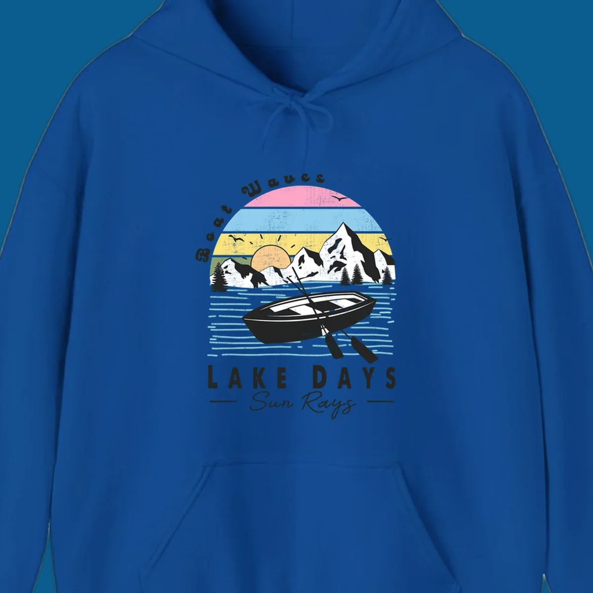 Vintage lake boat scenic design with mountains and sun, text reads Boat Waves, LAKE DAYS Sun Rays.
