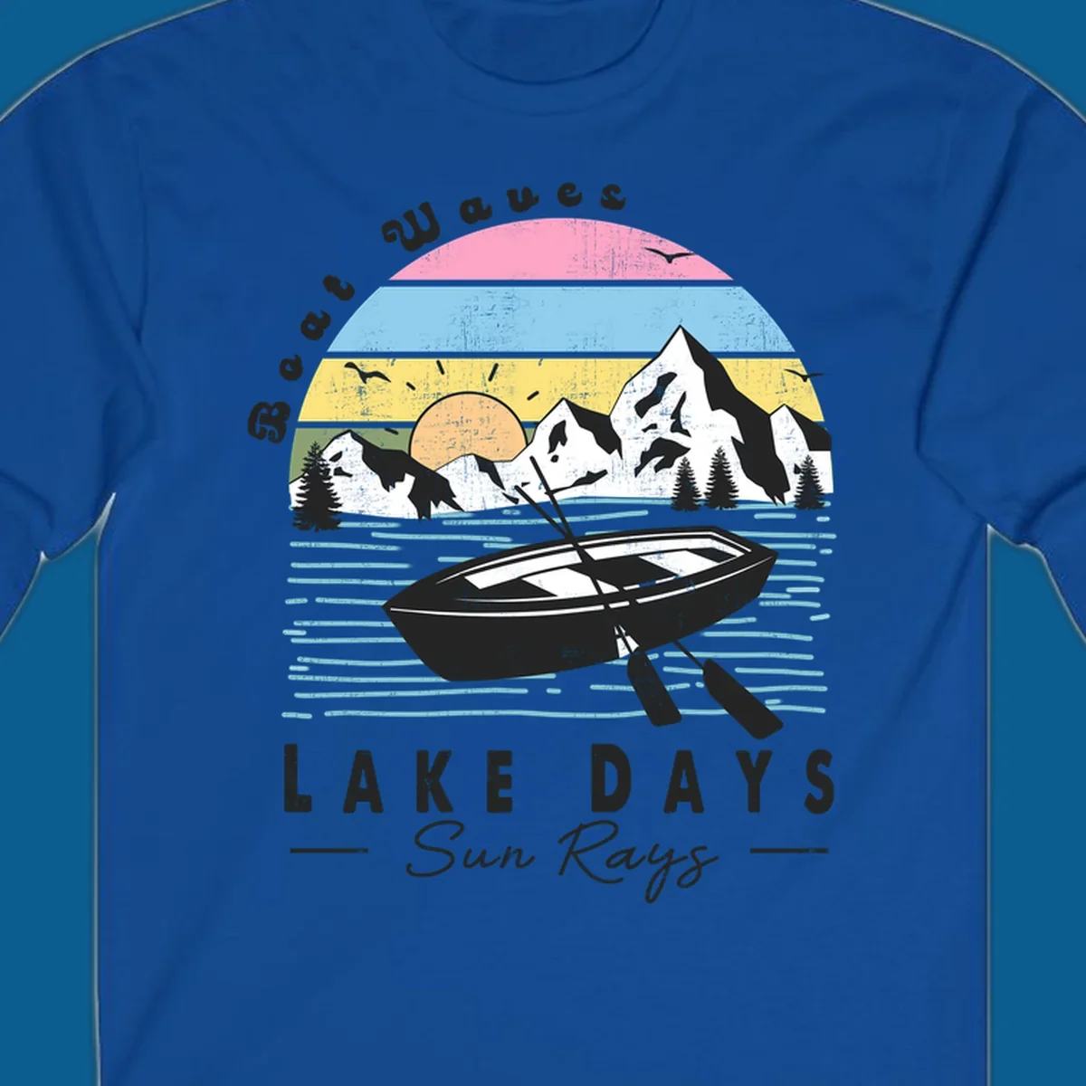 Vintage lake boat scenic design with mountains and sun, text reads Boat Waves, LAKE DAYS Sun Rays.