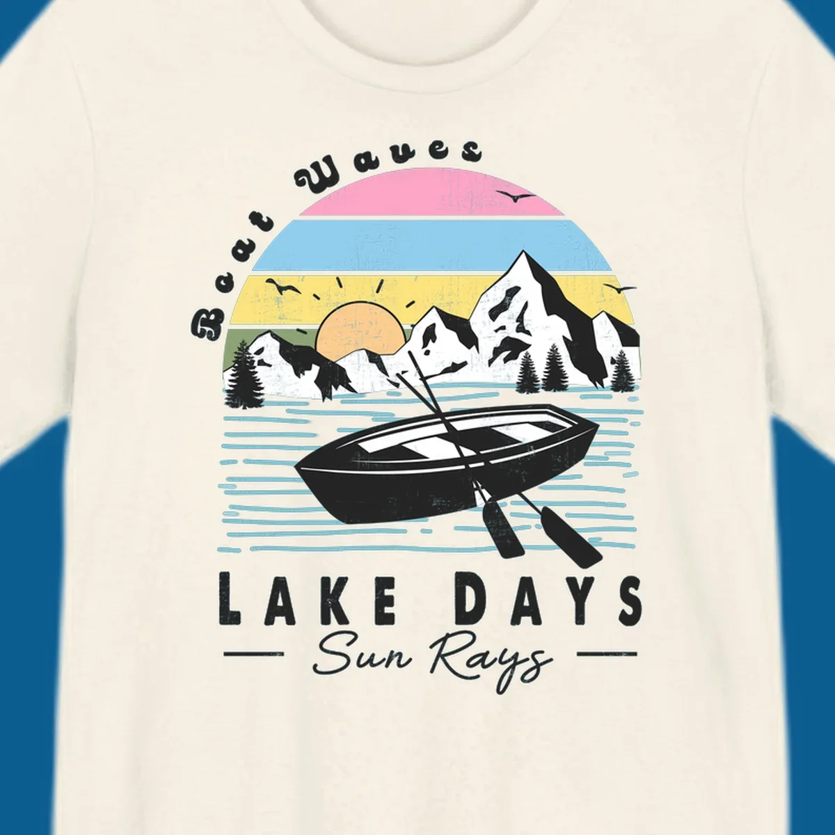 Vintage lake boat scenic design with mountains and sun, text reads Boat Waves, LAKE DAYS Sun Rays.