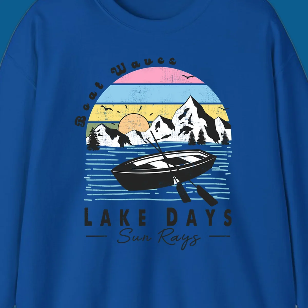 Vintage lake boat scenic design with mountains and sun, text reads Boat Waves, LAKE DAYS Sun Rays.