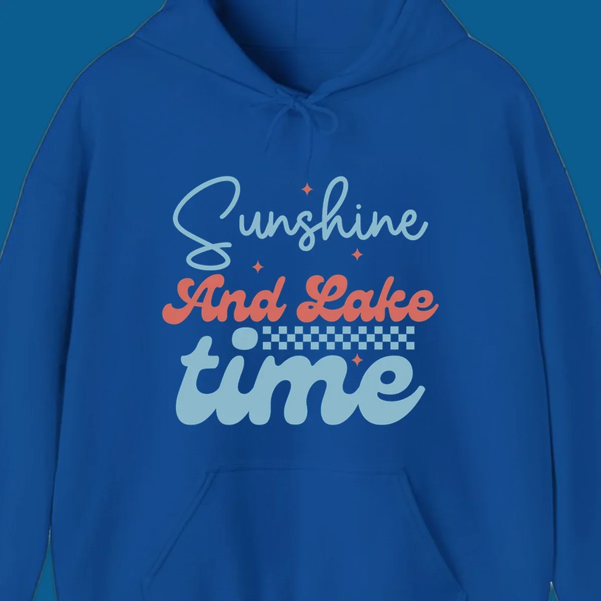 Retro sunshine and lake time text design with sparkle accents and checkerboard pattern.