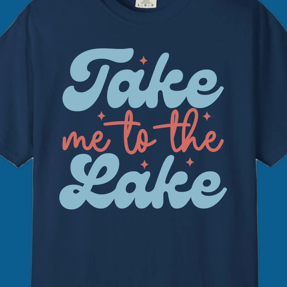 Retro 'Take me to the lake' text design with blue and coral lettering and white starbursts.