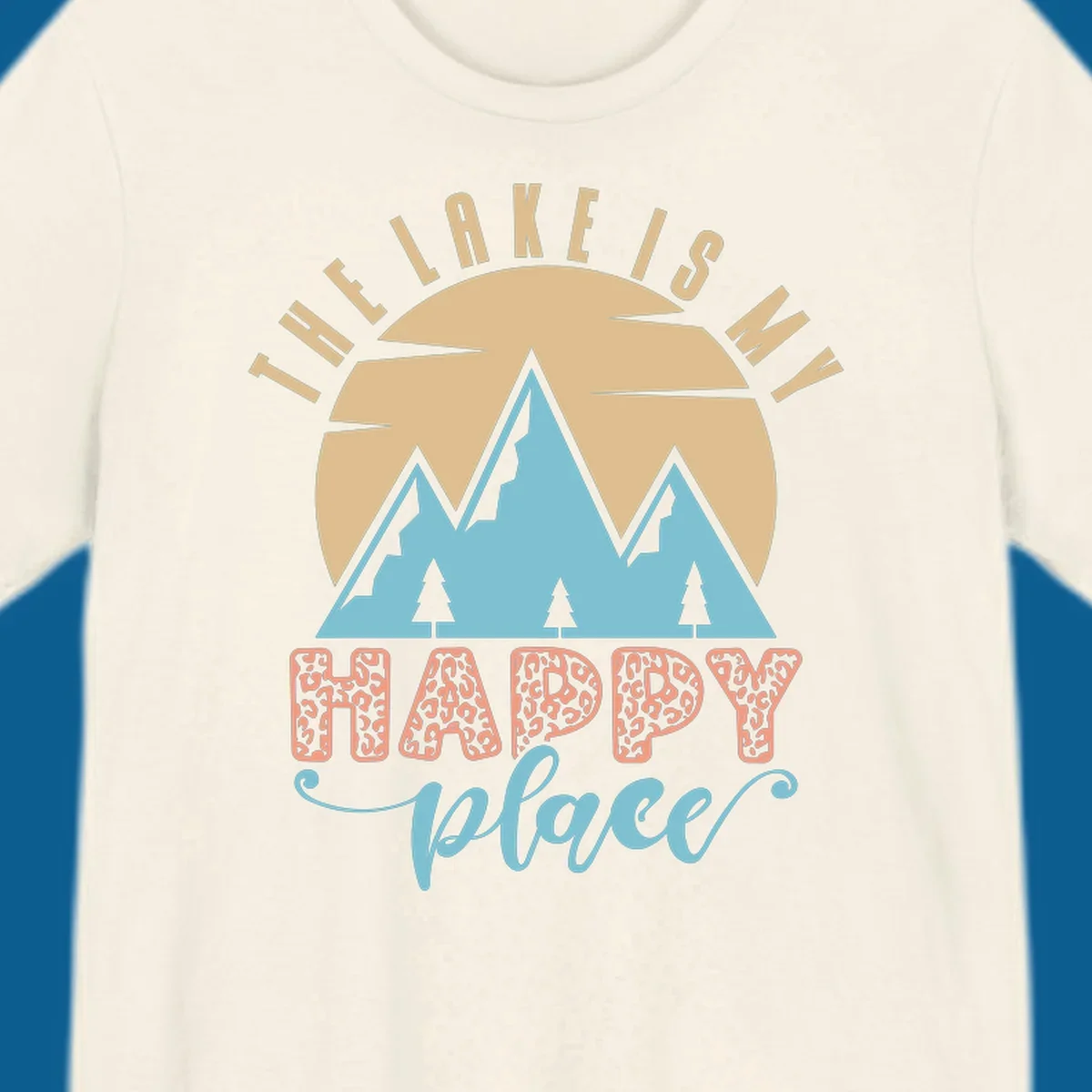 Illustration of mountains and sun with text 'The Lake Is My Happy Place' and leopard print.