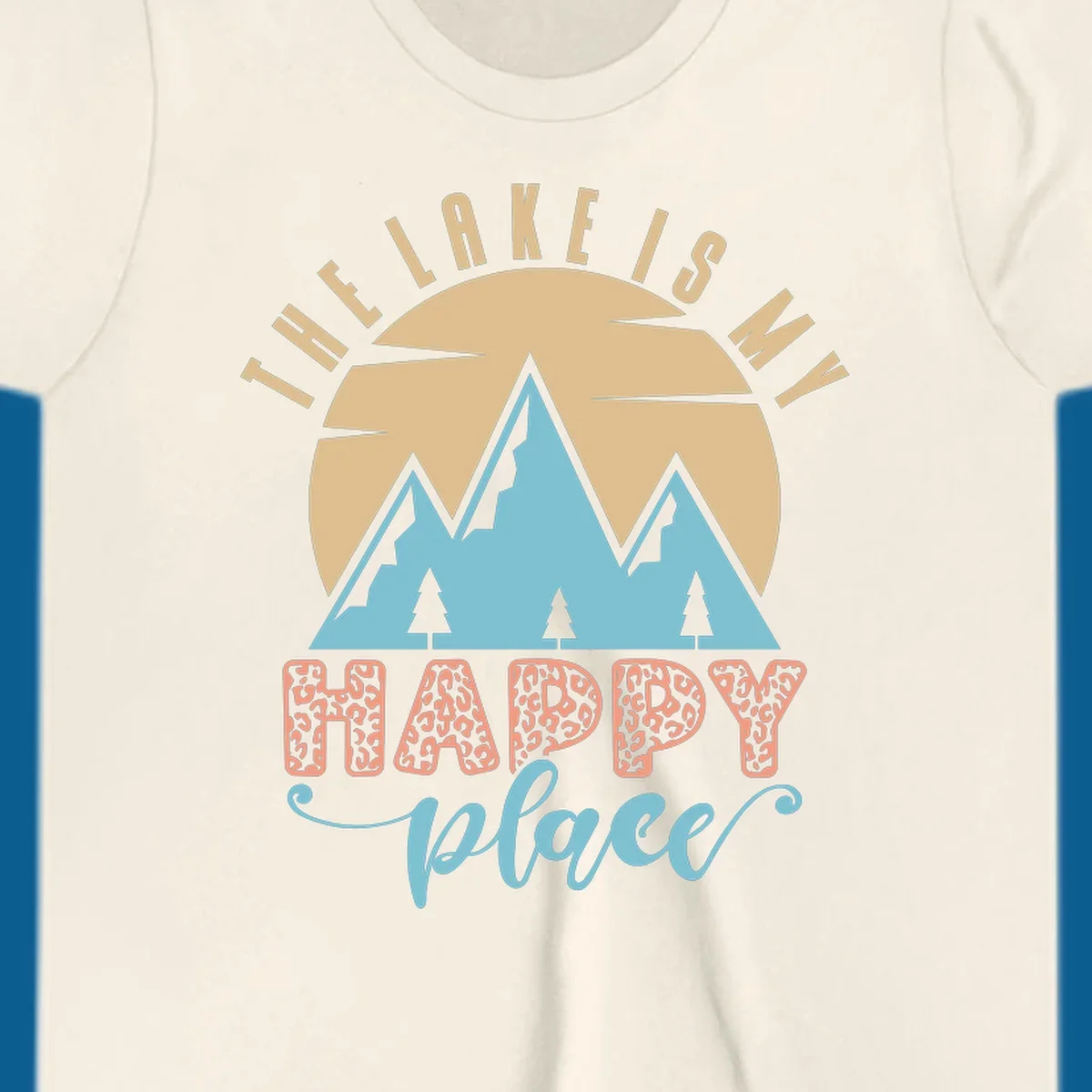 Illustration of mountains and sun with text 'The Lake Is My Happy Place' and leopard print.