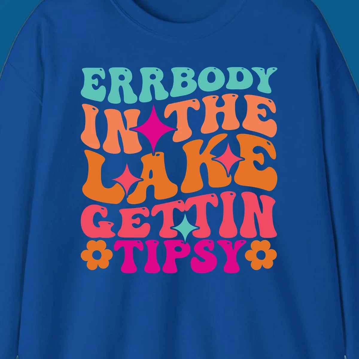 Retro groovy text design 'Errbody In The Lake Gettin Tipsy' with stars and flowers, lake-life-tipsy concept.