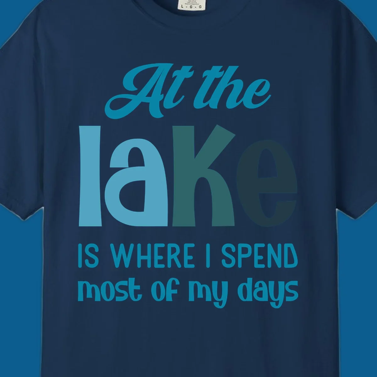 Typography design with the phrase "At the lake is where I spend most of my days".