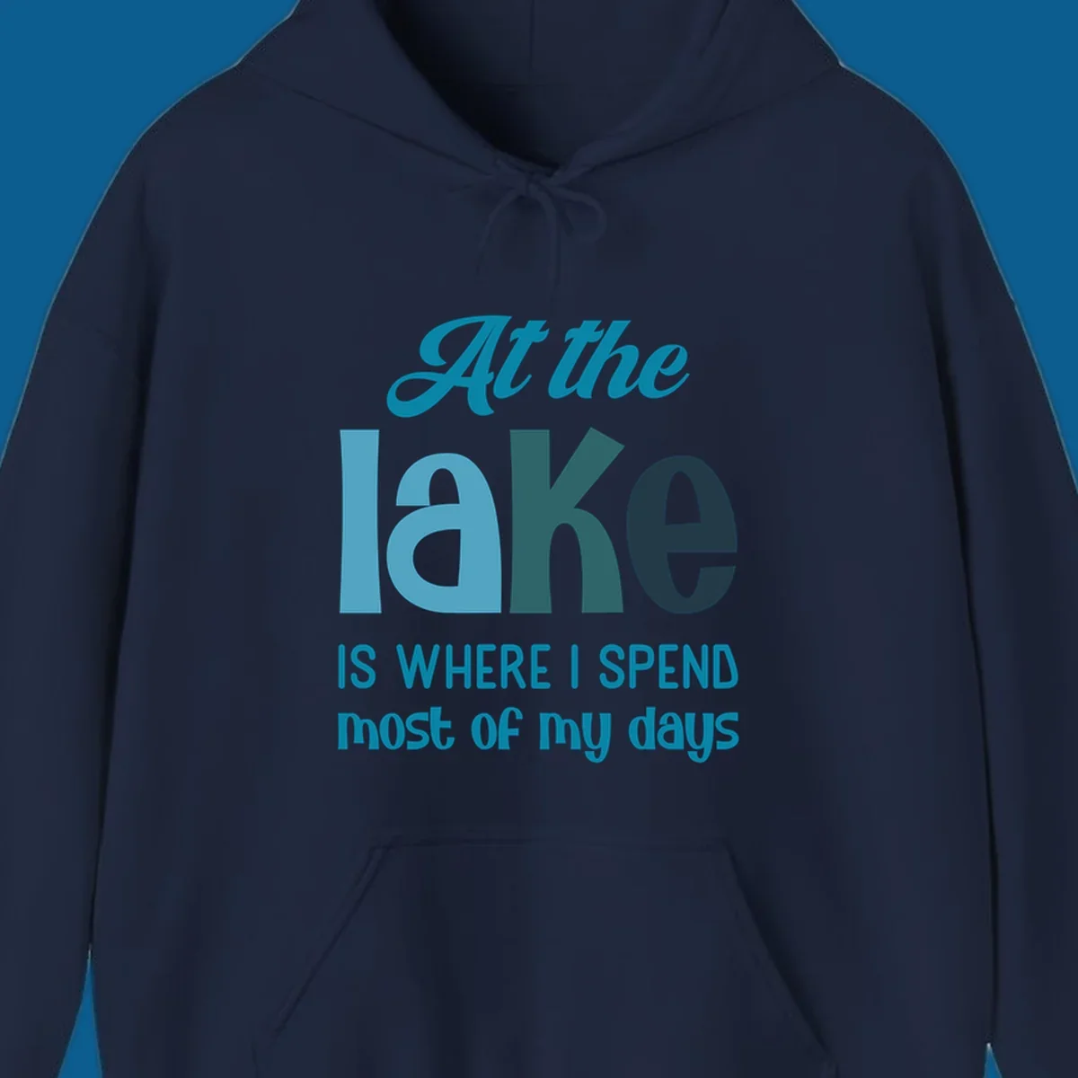 Typography design with the phrase "At the lake is where I spend most of my days".